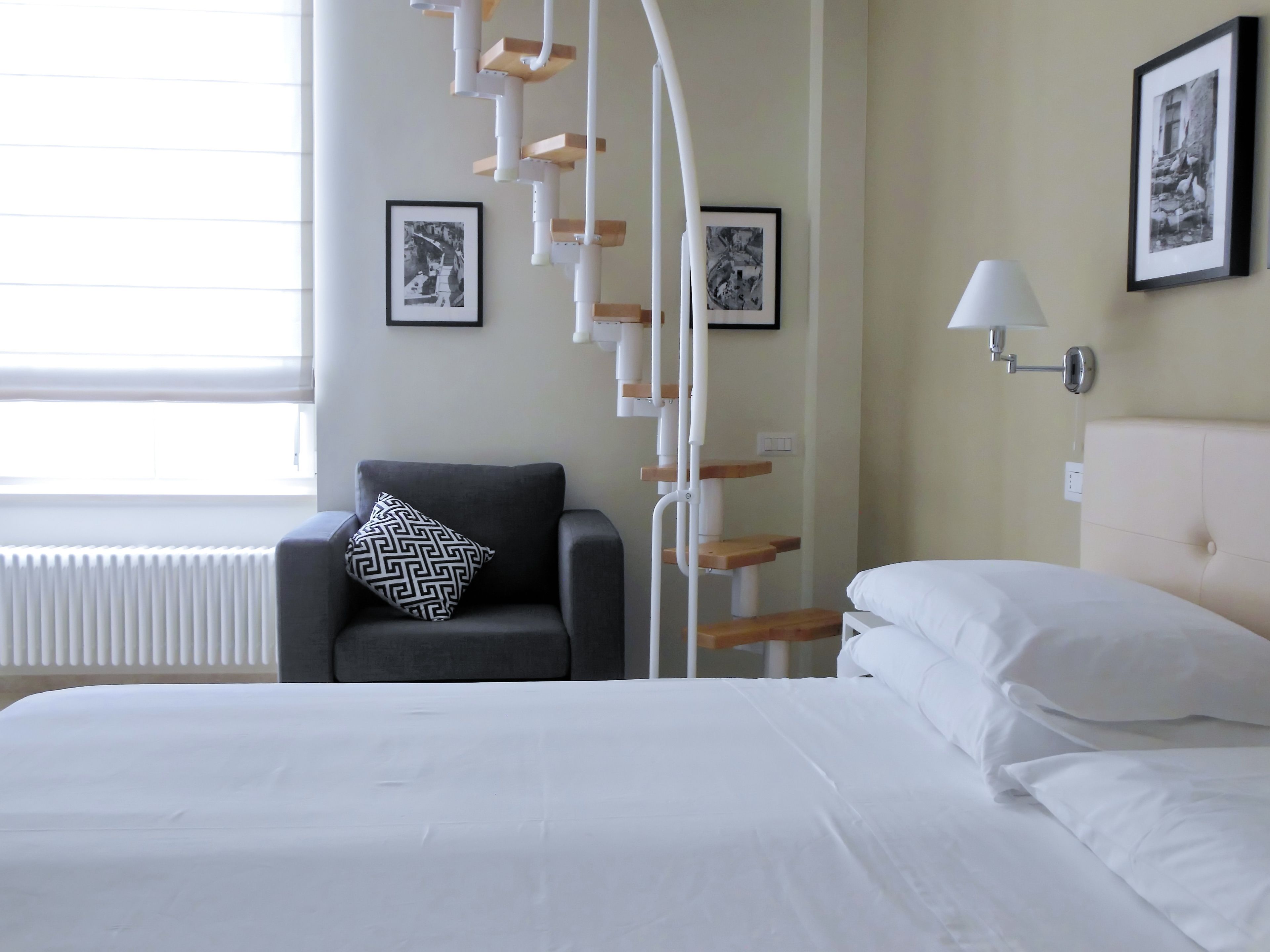 Habitación Deluxe | Ropa de cama de alta calidad, camas con pillow-top y minibar 