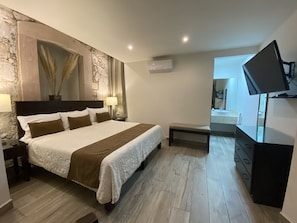 Standard Room, 1 Bedroom, Courtyard View | In-room safe, individually furnished, desk, blackout drapes