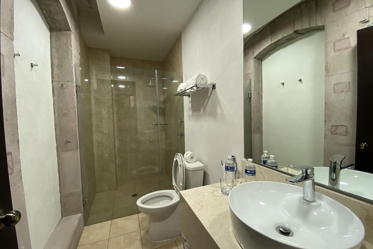 rainfall showerhead, free toiletries, hair dryer, slippers