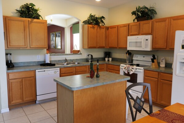 Villa, Private Pool | Private kitchen | Full-sized fridge, microwave, oven, stovetop - 7BR 4.5BA Home in Emerald Island Resort by CV-2708 (Kissimmee)