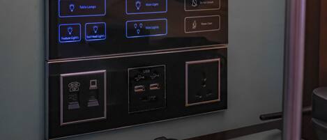 A control panel with various lighting options including table lamps, main light, mini lights, feature light, and bed head lights.