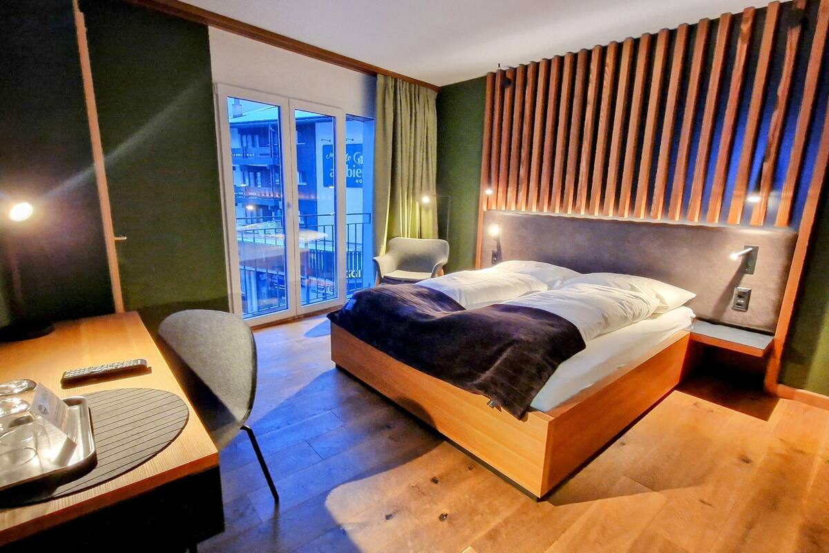 family room | in-room safe, individually decorated, individually furnished, desk