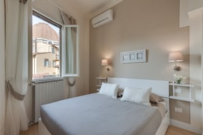 2 dormitorios, tabla de planchar con plancha, wifi y ropa de cama