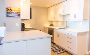 Fridge, microwave, oven, stovetop - Bright, Beautiful, Remodeled Island Sands 505 Condo (Wailuku)
