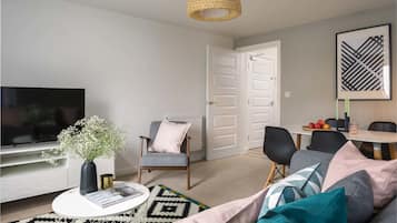 Canalside Scandinavian Flat | Living area | LED TV, Netflix