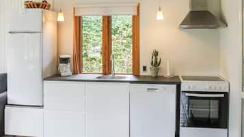 Fridge, stovetop, dishwasher, coffee/tea maker