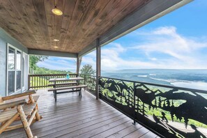 Outdoor dining - Rivers Ledge Cabin with breathtaking views, hot tub, & indoor pool! (Bryant)