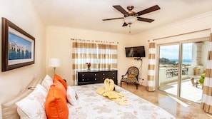 Master bedroom with view of the beach opens to your balcony.