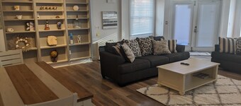 DOWNTOWN NEWPORT HOTSPOT! Private parking included - convenient. Three bedrooms.