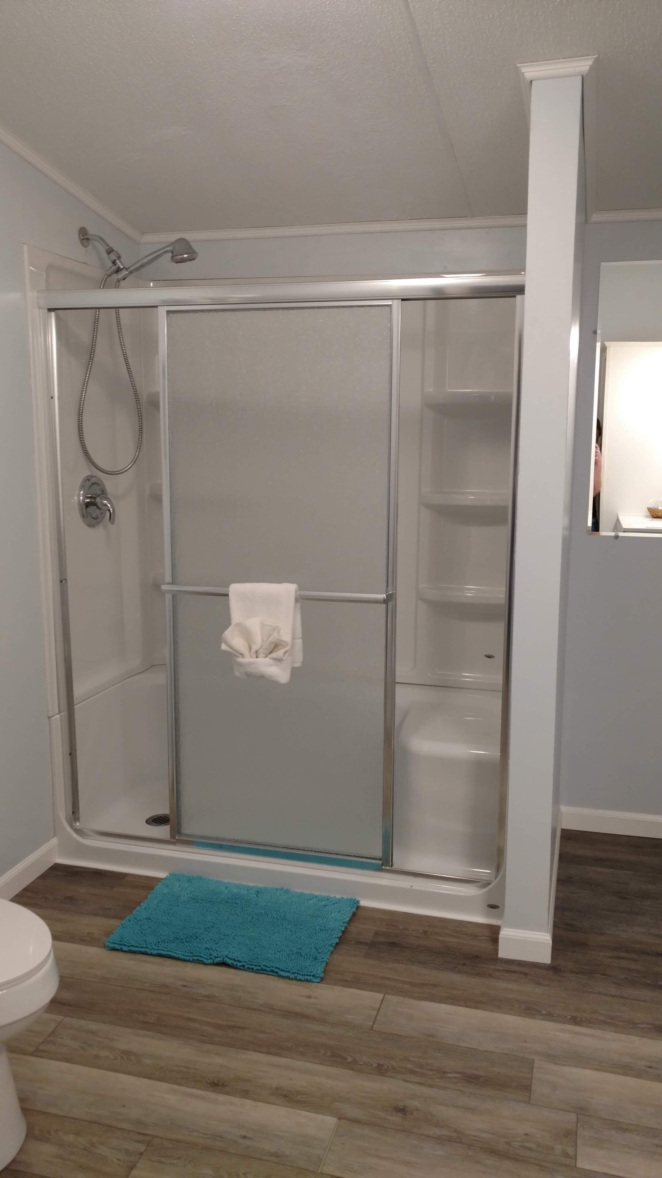 Combined shower/tub, hair dryer, towels, soap