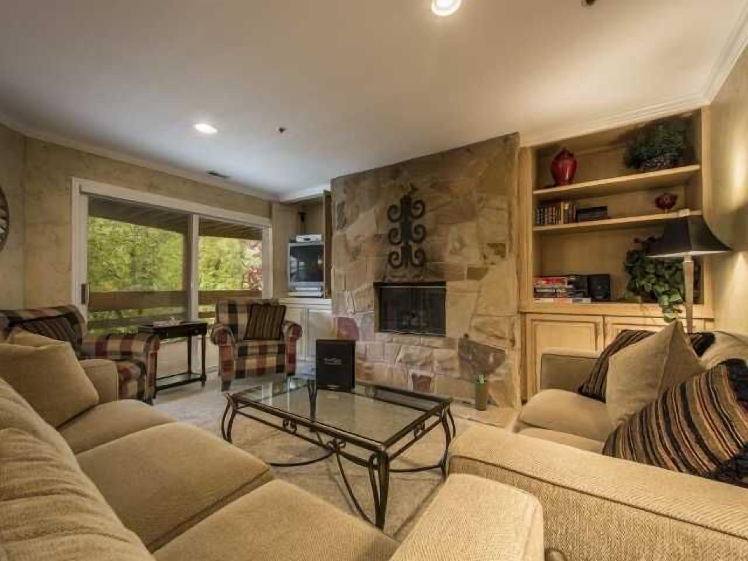 Smart TV, fireplace, DVD player, books