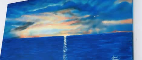 A painting of a seascape with a horizon line and a signature in the bottom right corner.