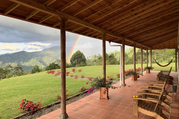 View from the 3m wide porch. Magical rainbows are visible most days!