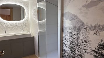 Bathtub, hair dryer, toilet paper