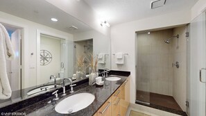 Combined shower/tub, hair dryer, towels, soap