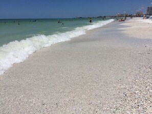 On the beach, sun loungers, beach towels