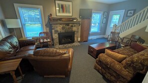 Smart TV, fireplace, DVD player, books