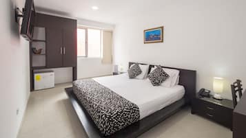 Habitación ejecutiva, 1 cama King size | Cortinas blackout, insonorización y tabla de planchar con plancha
