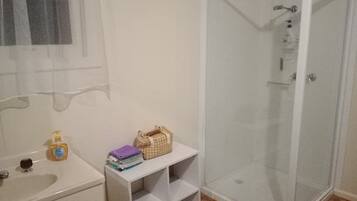 Shower, towels, toilet paper