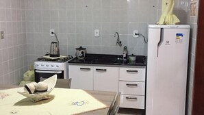 Exclusive Apartment, Multiple Beds, Accessible | Private kitchen | Fridge, microwave, oven, stovetop - Morada Center (Uruguaiana)