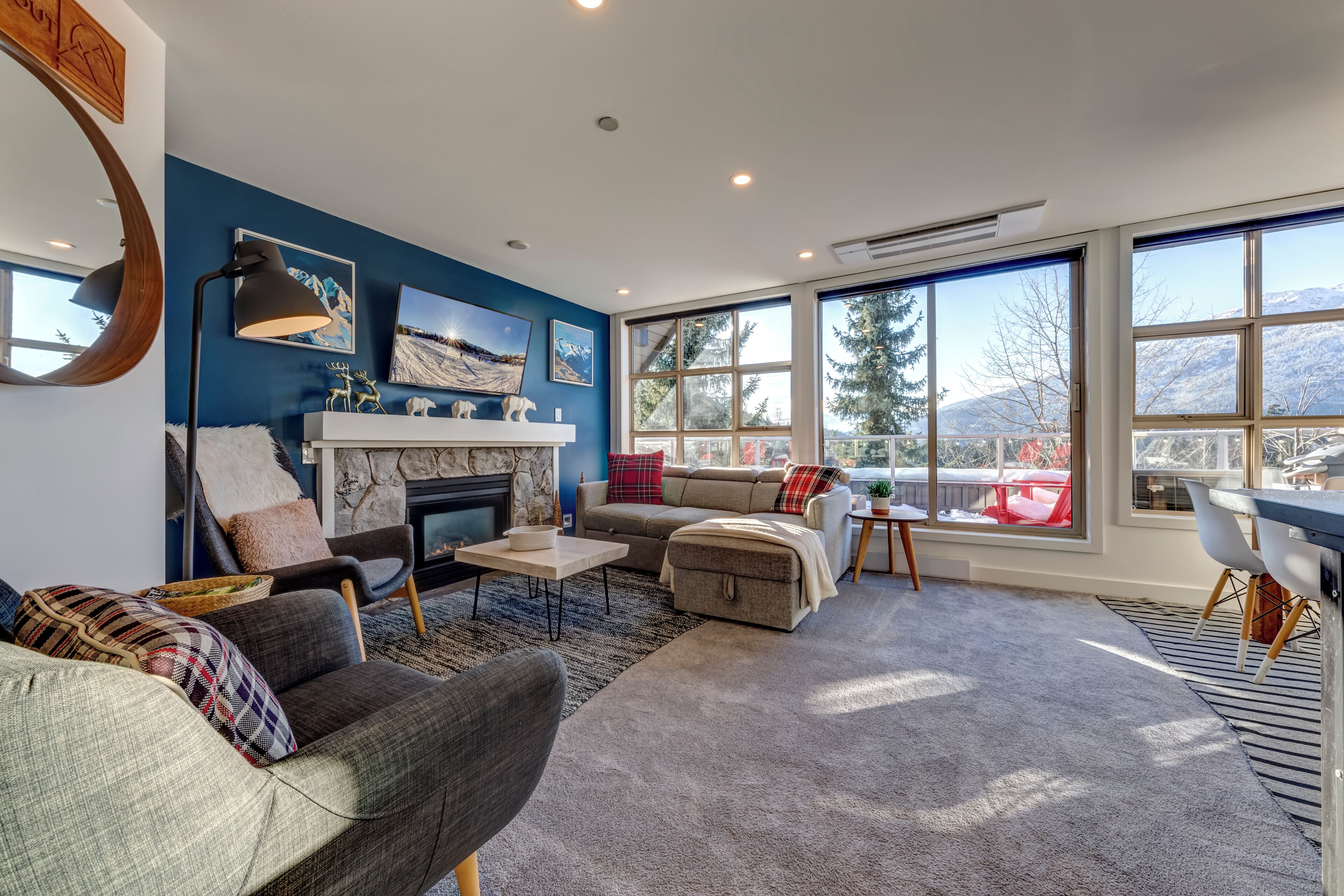 The living room couch stores the bedding and converts to sleeping for 2 guests.