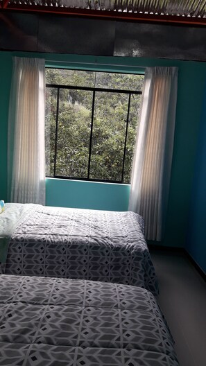 Family Room, 2 Double Beds, Non Smoking, Private Bathroom | Desk, blackout curtains, iron/ironing board, rollaway beds - Hospedaje Turístico Real Madrid (Chanchamayo)