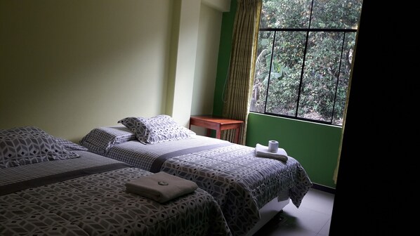 Family Room, 2 Double Beds, Non Smoking, Private Bathroom | Desk, blackout curtains, iron/ironing board, rollaway beds - Hospedaje Turístico Real Madrid (Chanchamayo)