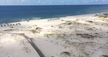 Premier Beachfront Sunsuite kattohuoneisto panoraamanäkymällä Meksikonlahdella