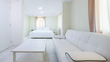 Deluxe Suite, 1 Bedroom | Minibar, iron/ironing board, rollaway beds, free WiFi