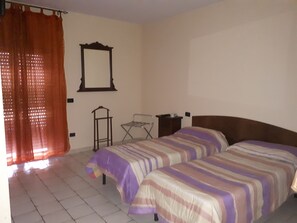 Desk, blackout curtains, cots/infant beds, bed sheets