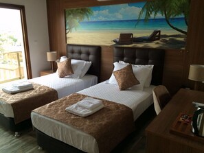 Habitación estándar con 1 cama matrimonial o 2 individuales | Minibar, caja de seguridad en la habitación, wifi gratis y ropa de cama