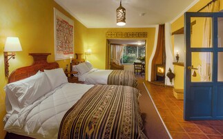 Deluxe Suite | 2 bedrooms, premium bedding, in-room safe, individually decorated