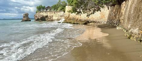 On the beach, sun-loungers, beach towels