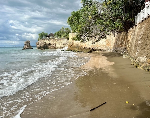 On the beach, sun loungers, beach towels