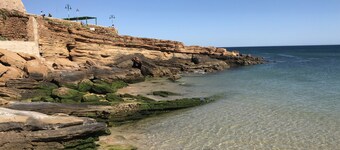 Cozy Apartment with Stunning Sea Views, One Minute Walk from the Beach