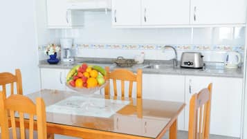 Fridge, microwave, coffee/tea maker, toaster
