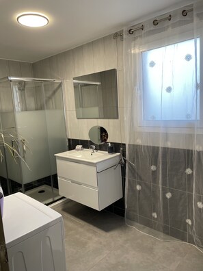 Shower, hair dryer, soap, shampoo
