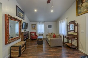 Smart TV, fireplace, DVD player, books