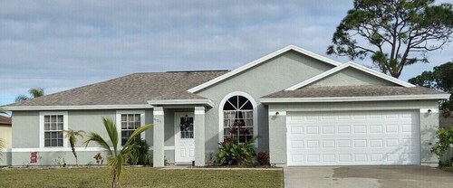 Beautiful home in Palm Bay convenient to Bayside Lakes Shoppes and golf courses.