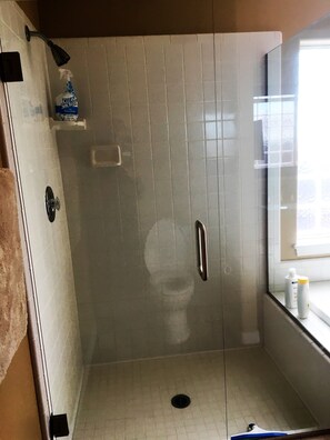 Bathtub, hair dryer, towels, soap