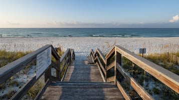 On the beach, sun loungers, beach towels