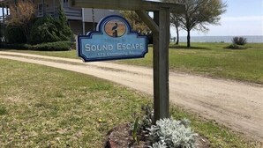 A sign for Sound Escape Community Resort. - Peaceful Getaway with Amazing Views - Cape Lookout & Beaufort nearby - SLEEPS 8 (Davis)
