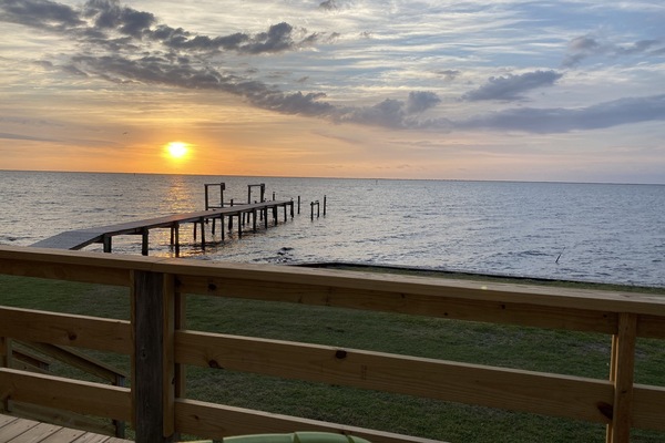 Sunrise from lower east porch