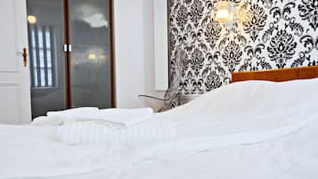 2 habitaciones, tabla de planchar con plancha, internet y ropa de cama