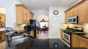 Family Villa, Hot Tub, Garden Area | Shared kitchen | Fridge, microwave, oven