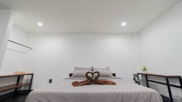 Desk, blackout curtains, free WiFi, bed sheets