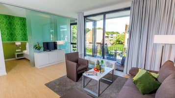 Comfort-Apartment, 1 Schlafzimmer (inklusive Reinigungsgebühr) | Wohnbereich | Flachbildfernseher