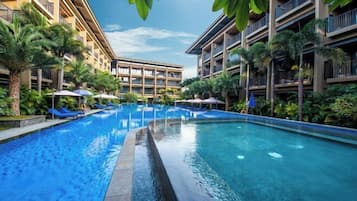 Outdoor pool, open 8 AM to 9:30 PM, pool umbrellas