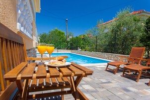 Outdoor pool, open 10 AM to 8 PM, sun loungers