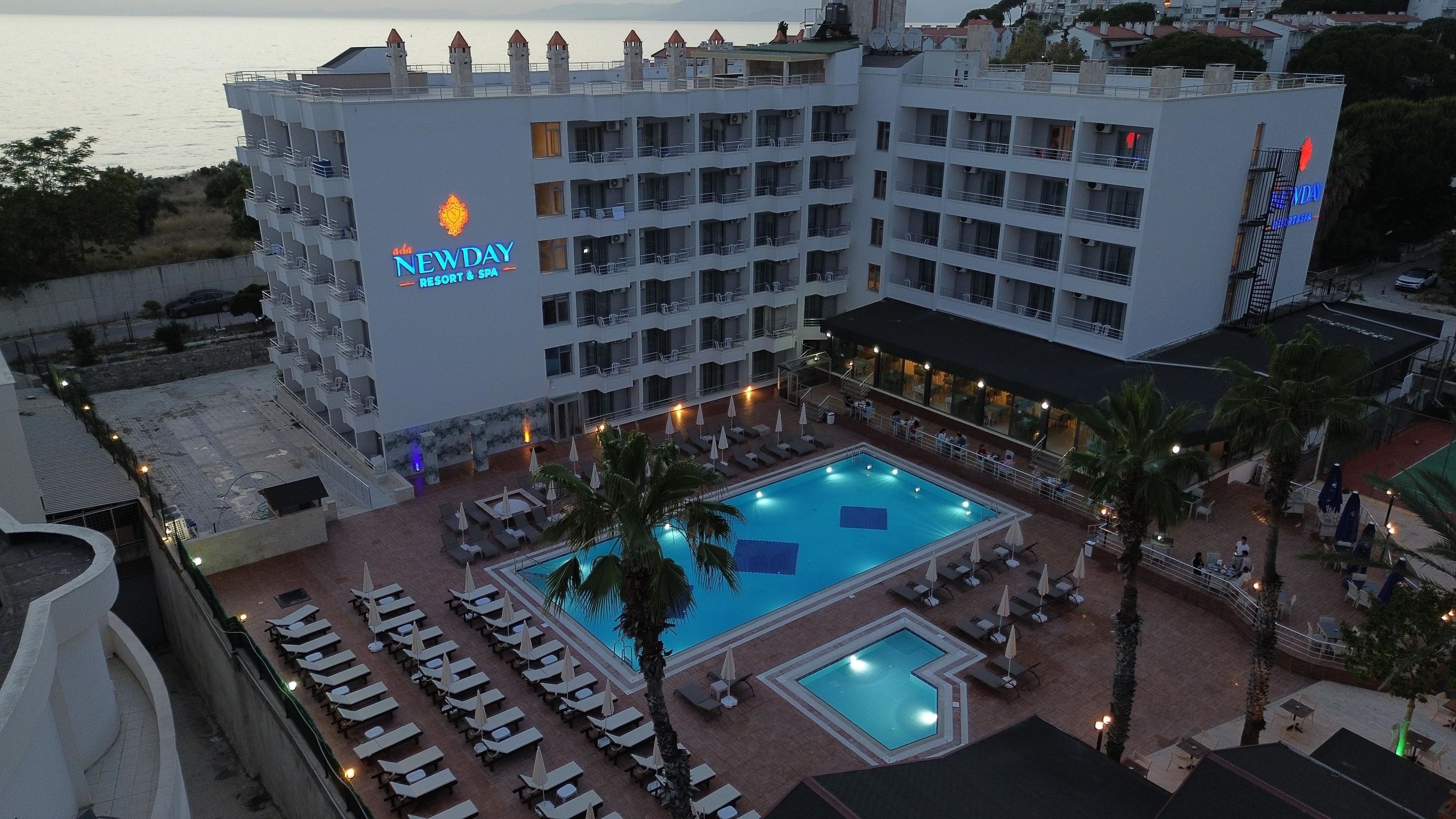 Seasonal outdoor pool, pool umbrellas, pool loungers